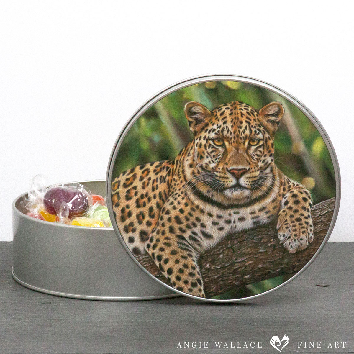 'Serenity' Leopard round storage tin by wildlife artist Angie.